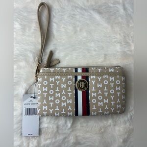 Tommy Hilfiger faux leather logo gold zipper wristlet wallet.